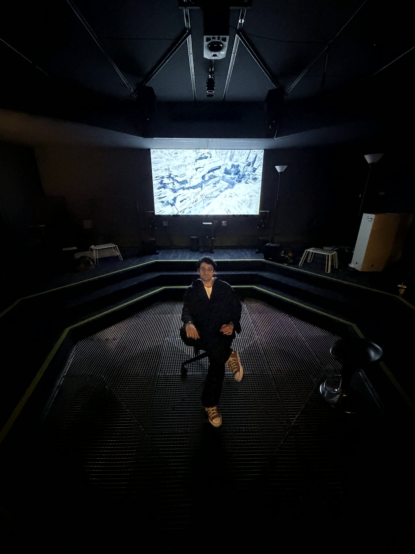 The octagonal projection room, viewer seated at center